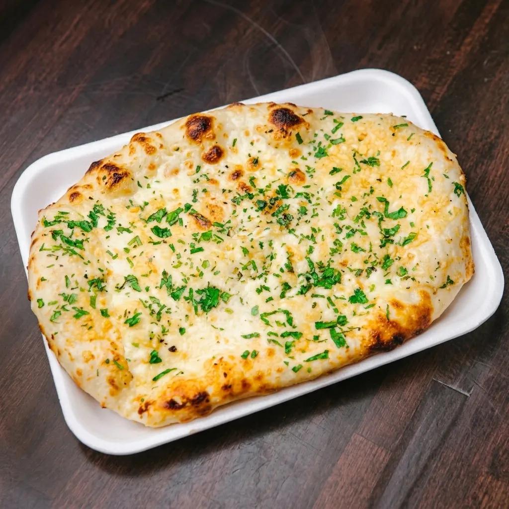 Garlic Naan served at Cafe Junoon, an Indian and Pakistani cafe in Cornerstone, Northeast Calgary
